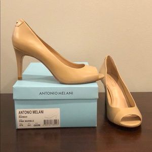 Antonio Melani nude peep toe pump.